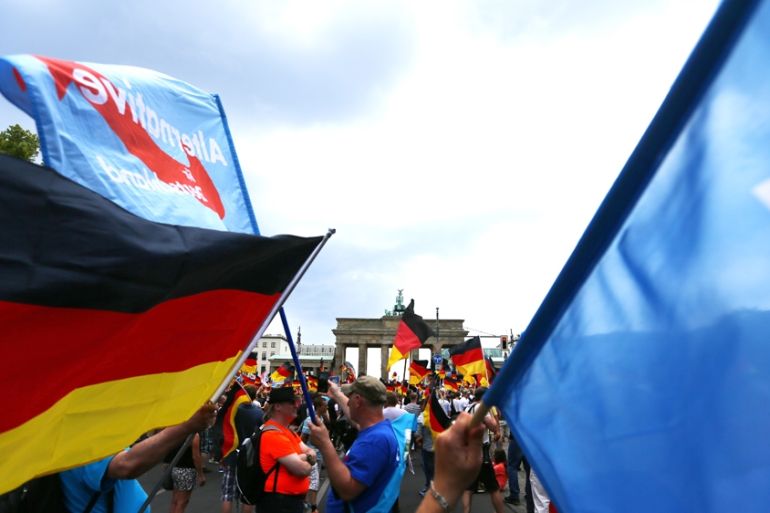 Supporters of the Anti-immigration party Alternative for Germany (AfD) attend a protest in Berlin, Germany May 27, 2018. [Hannibal Hanschke/Reuters]