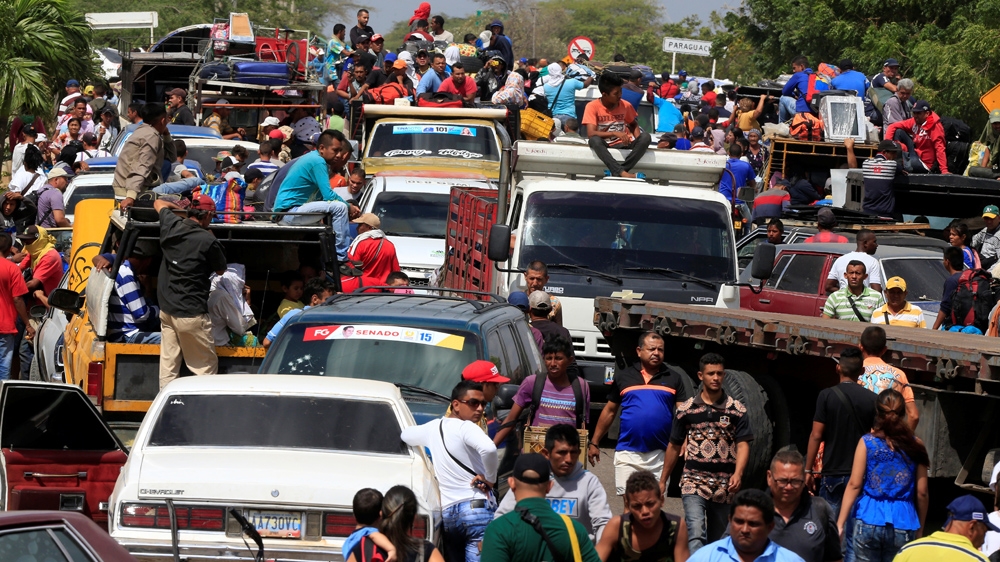 Almost one million Venezuelans have crossed the porous border with Colombia [Jaime Saldarriaga/Reuters]