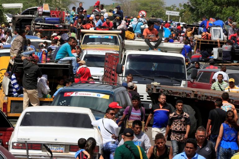 Venezuelans line up to cross into Colombia