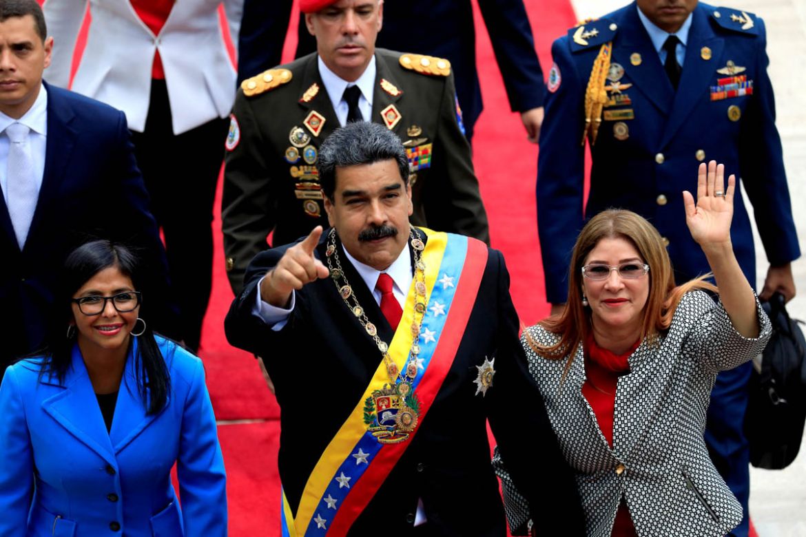 Venezuela''s President Nicolas Maduro, flanked by his wife Cilia Flores and National Constituent Assembly President Delcy Rodriguez, arrives for a special session of the National Constituent Assembly t