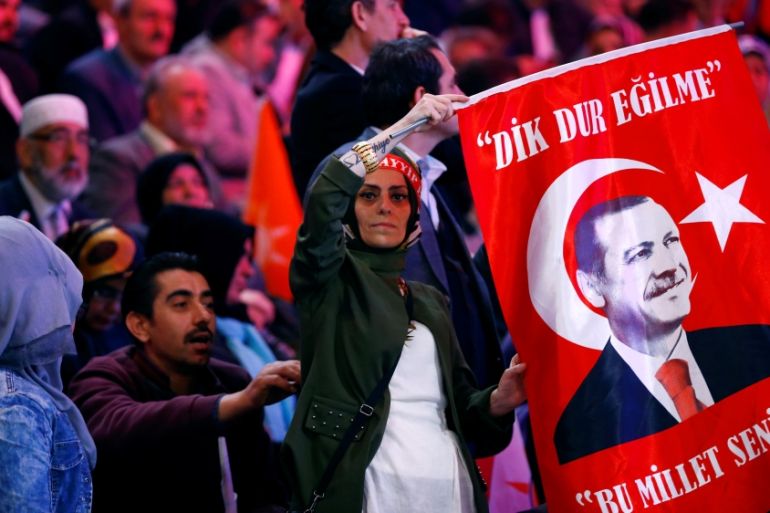 Supporters of Turkish President Tayyip Erdogan wait for his arrival for AK Party''s Istanbul congress