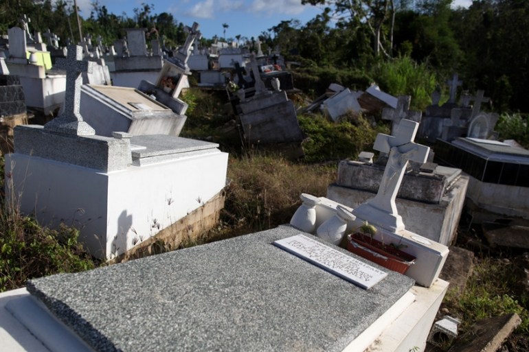 Graves destroyed during Hurricane Maria in September 2017, are seen at a cemetery, in Lares, Puerto Rico February 8, 2018. Picture taken February 8, 2018. [Alvin Baez/Reuters]