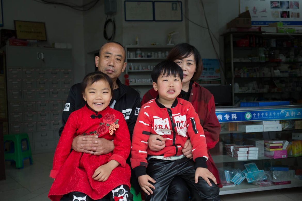 , family photo of Zhao Xinghua, his wife Chen Jinlian, daughter Zhao Youwen and son Zhao Youcheng. Zhao said life has moved on and it’s becoming better and better, although he still feels the pain of