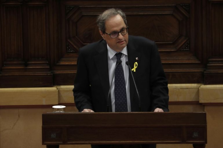 Quim Torra, the candidate proposed by former Catalan leader Puigdemont to head the regional Catalan government, delivers his speech during an investiture debate in Barcelona