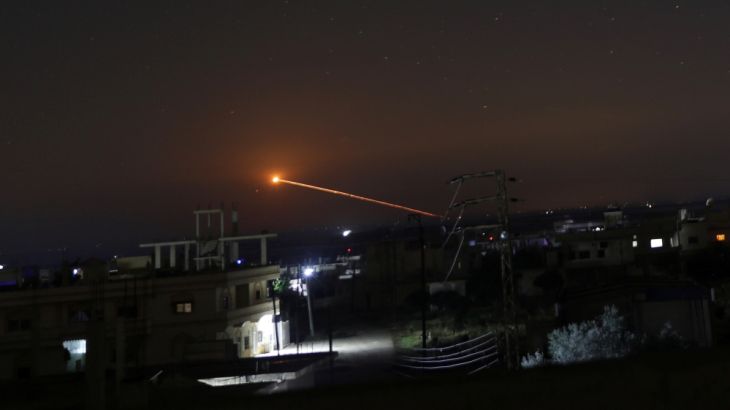 Missile fire is seen over Daraa
