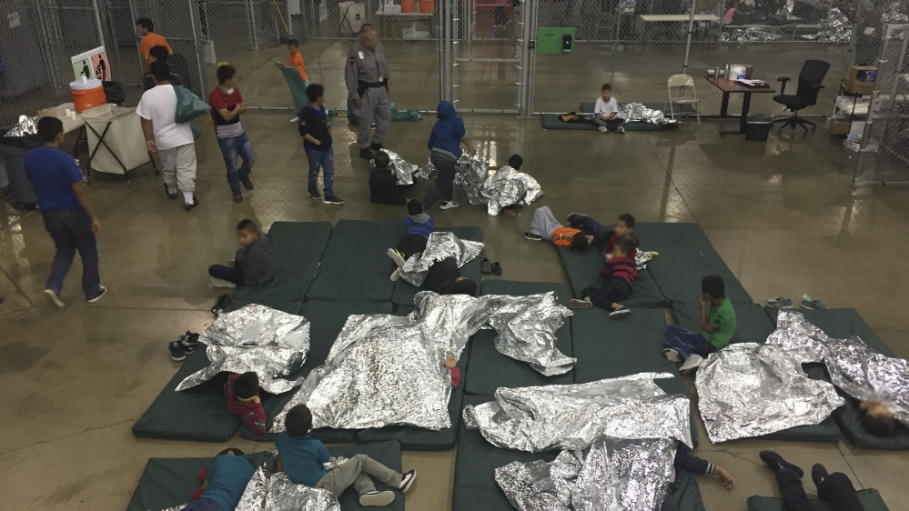 This US Customs and Border Protection photo obtained June 18, 2018, shows children at the Central Processing Center in McAllen, Texas, on May 23, 2018 [Handout/US Customs and Border Protection/AFP]