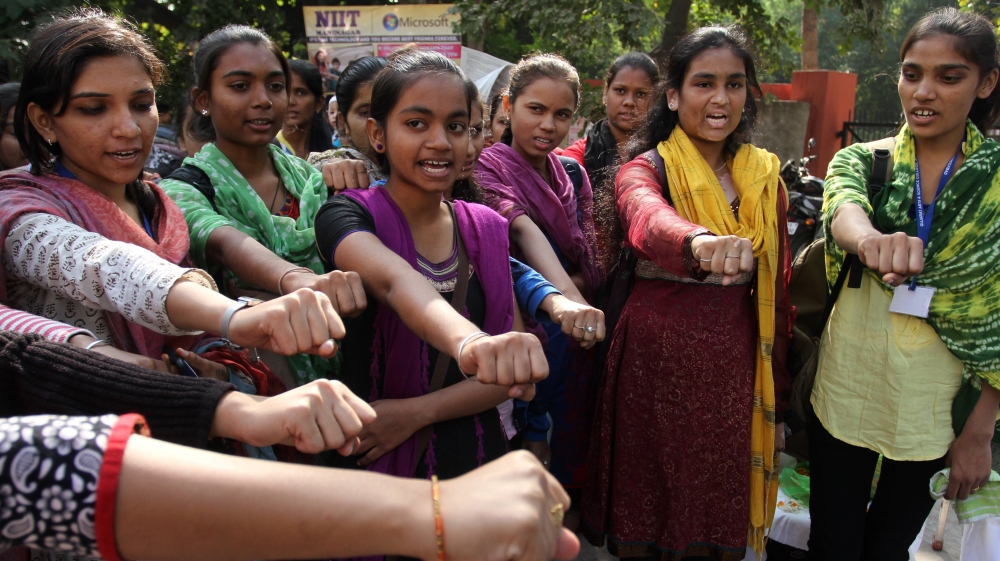 Indian girls take a pledge to act towards stopping atrocity on women [File: Ajit Solanki/AP Photo]