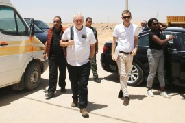 Britain''s opposition leader Jeremy Corbyn walks during his visit to Al Zaatari refugee camp in Mafraq