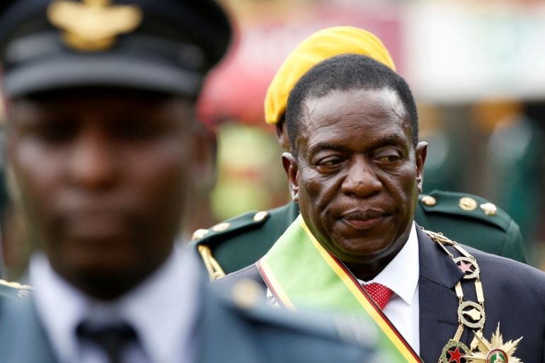 Emmerson Mnangagwa walks after he was sworn in as Zimbabwe''s president in Harare