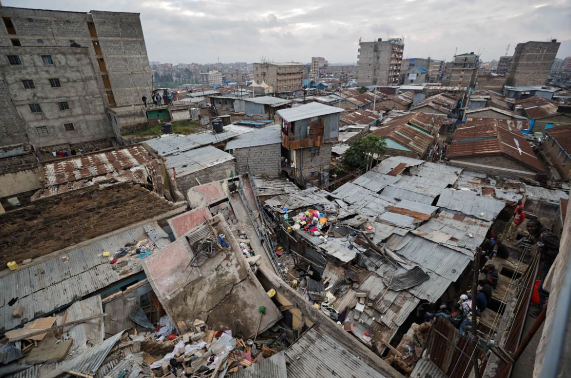 The scene of a five-storey collapsed building is seen in the Huruma neighborhood of Nairobi, Kenya Sunday, June 3, 2018. Three people have been killed in a collapsed building in the low income residen