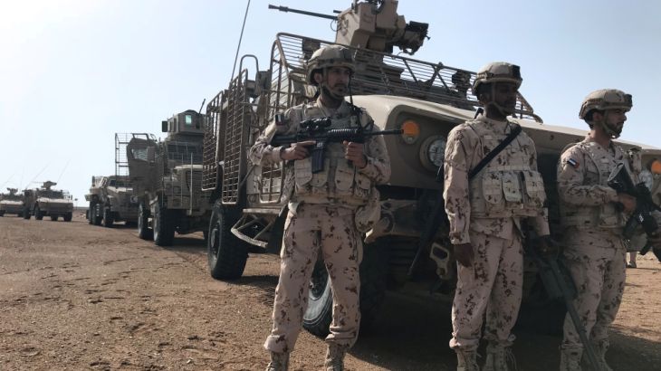 Members of the UAE armed forces secure an area while searching for landmines in Al-Mokha