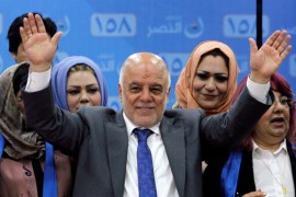 FILE PHOTO: Iraqi Prime Minister Haidar al-Abadi attends the election campaign, along with his supporters in Kirkuk