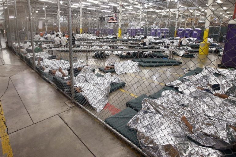 Immigrant children in cages Obama2014 Reuters
