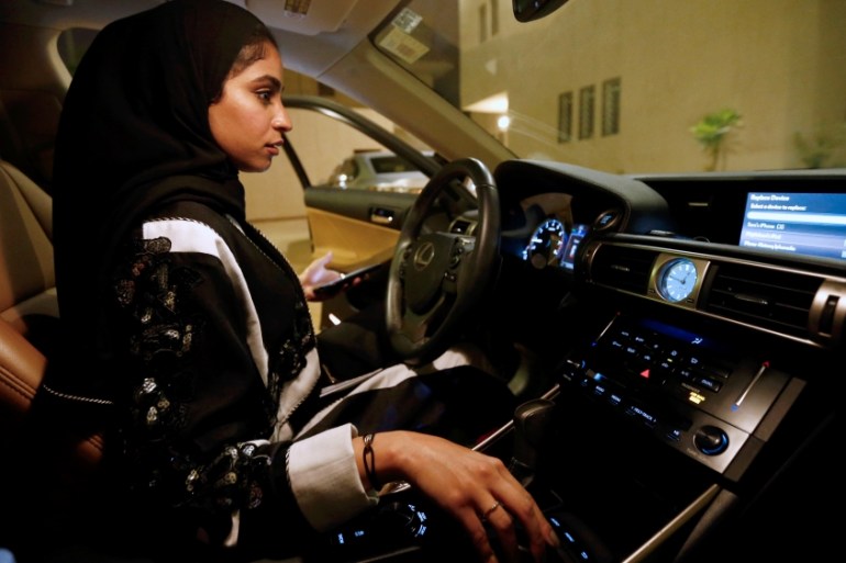 Majdooleen, who is among the first Saudi women allowed to drive in Saudi Arabia gets ready before she starts to drive her car in her neighborhood in Riyadh