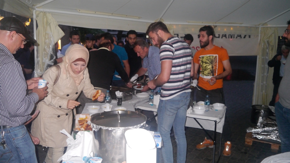 Lentil soup, chicken, kibbeh and bread were served for the fast-breaking meal [Yermi Brenner/Al Jazeera]