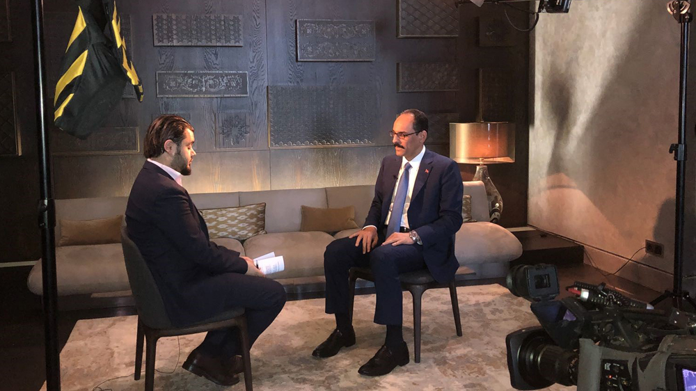 Ibrahim Kalin, Turkish presidential spokesperson (right) talks to Al Jazeera's Jamal Elshayyal (left) [Al Jazeera]