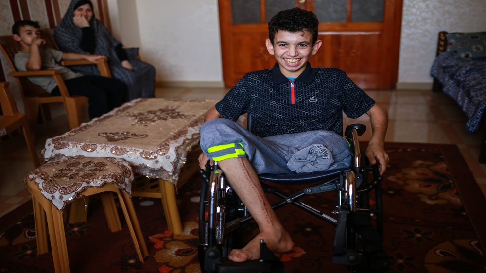Abdullah al-Anqar remains full of energy but is prone to mood swings and refuses to go back to school, his mother says [Hosam Salem/Al Jazeera]