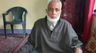 Ghulam Hassan Sheikh, father of Atif Hussain Sheikh, says his son was booked under PSA because he was vocal about his pro-independence political choice [Anando Bhakto/Al Jazeera] 