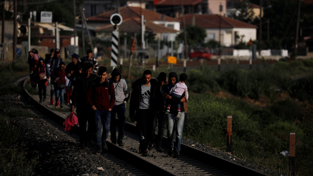 Refugees cross the Turkish-Greek land border to enter the country [Alkis Konstantinidis/Reuters] 