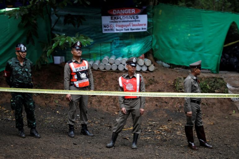 Police stand guard outside the Tham Luang cave complex after Thailand''s government instructed members of the media to move out urgently, in the northern province of Chiang Rai