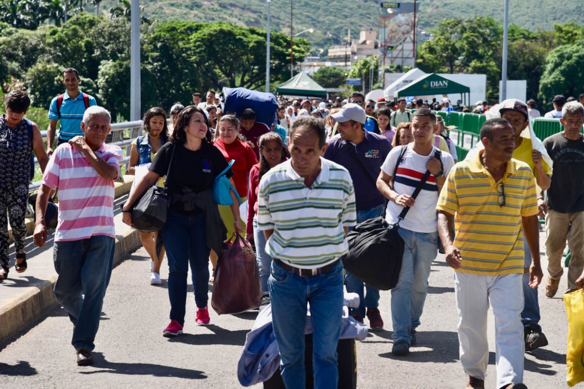 Over 35,000 people cross the bridge from Venezuela into Colombia each day. Many return daily, but around 4,000 people stay in the border city, Cucuta, or move on further into Colombia or to neighborin