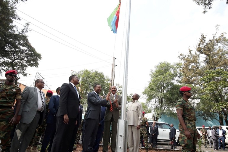 Eritrea''s President Isaias Afwerki and Ethiopia''s Prime Minister, Abiy Ahmed raise Eritrea''s flag during a inauguration ceremony marking the reopening of the Eritrean embassy in Addis Ababa, Ethiopia