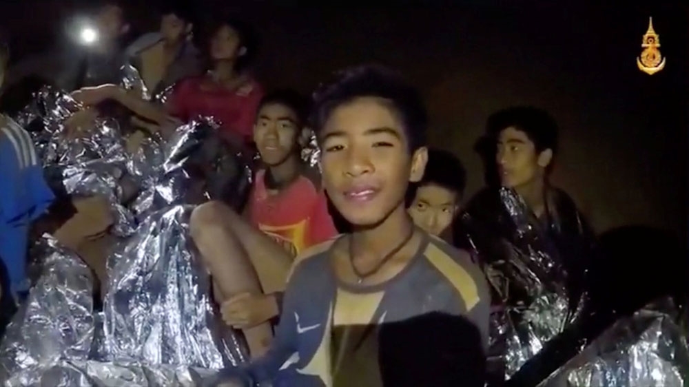 The boys were found dishevelled and emaciated on a muddy ledge inside the cave [Thai Navy SEALs via Reuters]