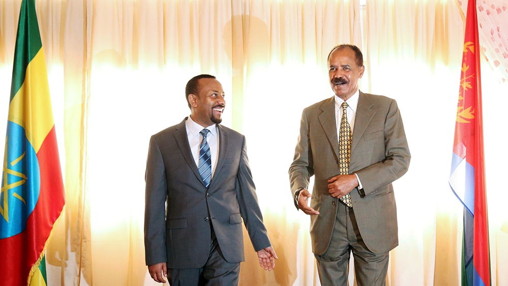 Ethiopian Prime Minister Abiy Ahmed and Eritrean President Isaias Afwerki during a ceremony marking the reopening of the Eritrean embassy in Addis Ababa [Tiksa Negeri/Reuters]