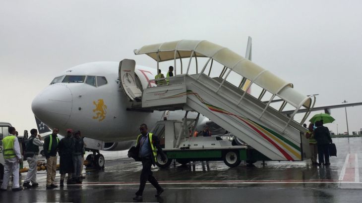Ethiopian Airlines staff prepare their plane as they resume flights to Eritrea''s capital Asmara at the Bole International Airport in Addis Ababa