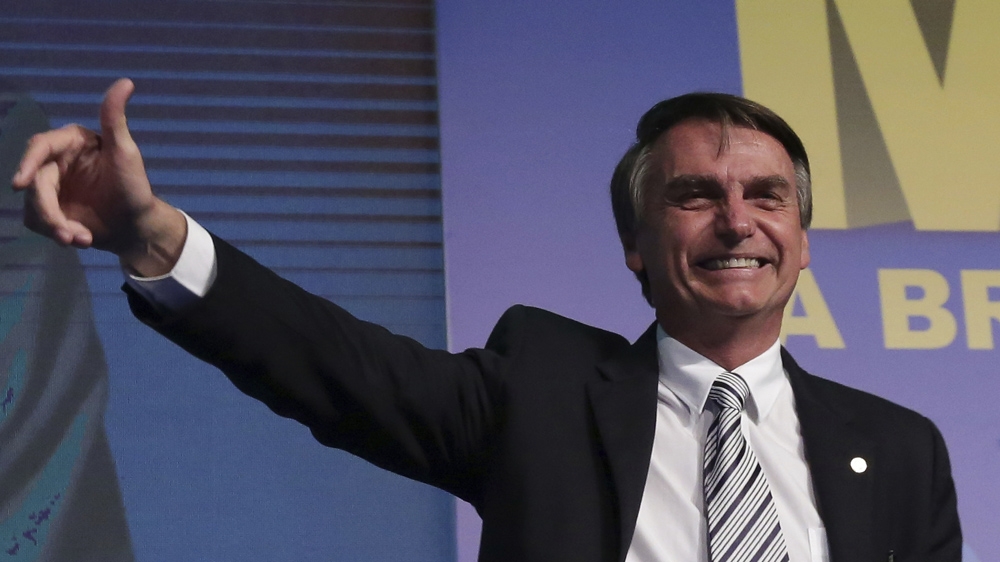 Jair Bolsonaro, of the Social Liberty Party, is second in the polls [File: Eraldo Peres/AP Photo]