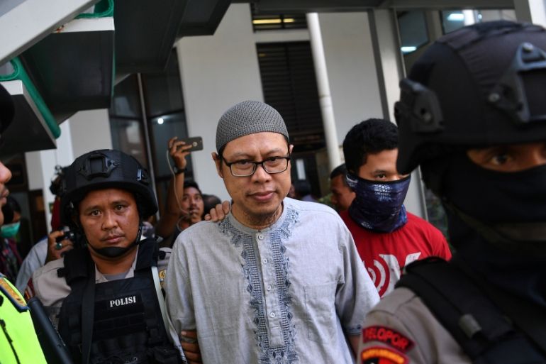 A chief of Jemaah Ansharut Daulah (JAD), the country''s largest Islamic State-linked group, arrives for his trial at South Jakarta court in Jakarta