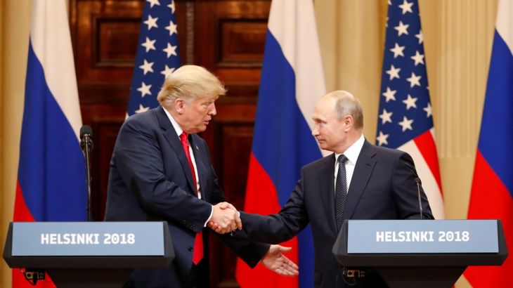 U.S. President Donald Trump and Russian President Vladimir Putin shake hands as they hold a joint news conference after their meeting in Helsinki, Finland July 16, 2018. REUTERS/Grigory Dukor
