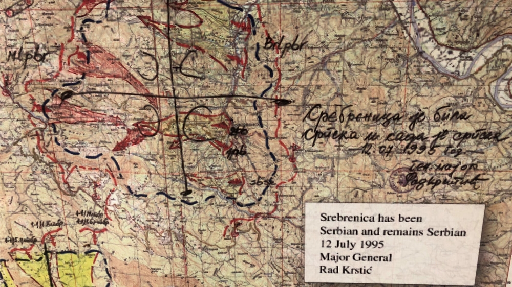 At the exhibit, a map of Srebrenica is on display with a message written by convicted Bosnian Serb war criminal Radislav Krstic reading 'Srebrenica has been Serbian and remains Serbian. 12 July 1995' [Courtesy of Mirnes Kovac]