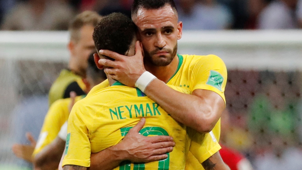 Neymar is embraced by Renato Augusto at the end of the match [Toru Hanai/Reuters]