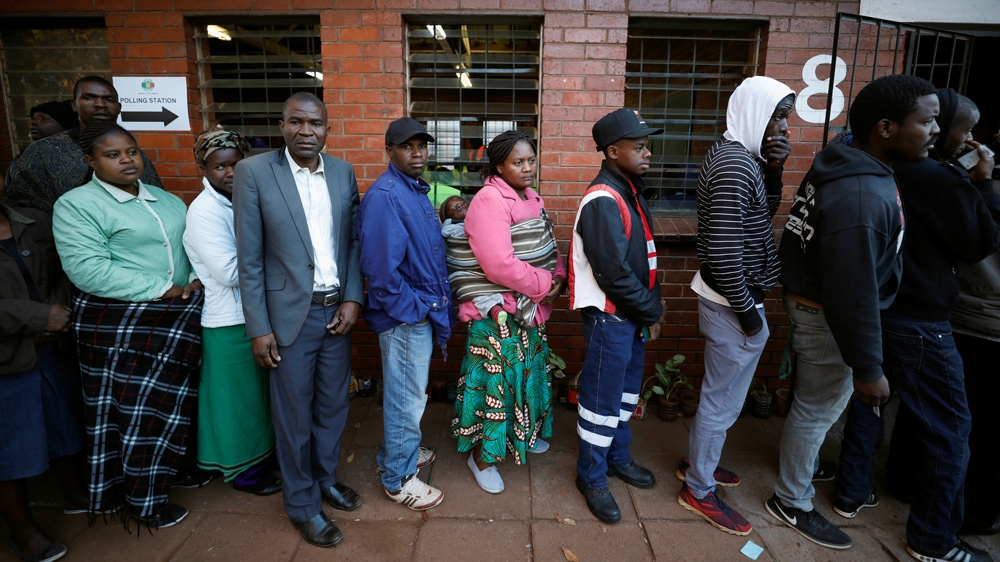 Voter turnout was high in the country's first election since Robert Mugabe was pushed out of office last year [Mike Hutchings/Reuters]