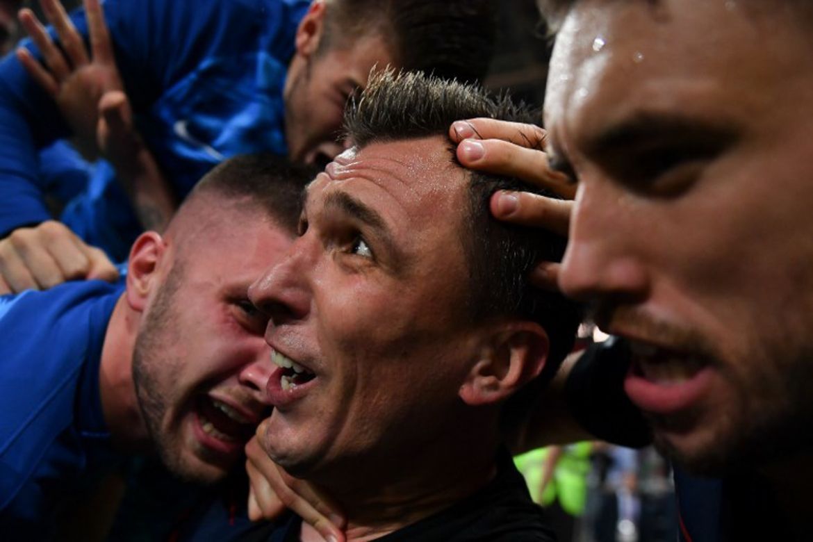 Croatia''s forward Mario Mandzukic (C) celebrates with teammates after scoring his team''s second goal during the Russia 2018 World Cup semi-final football match between Croatia and England at the Luzhn