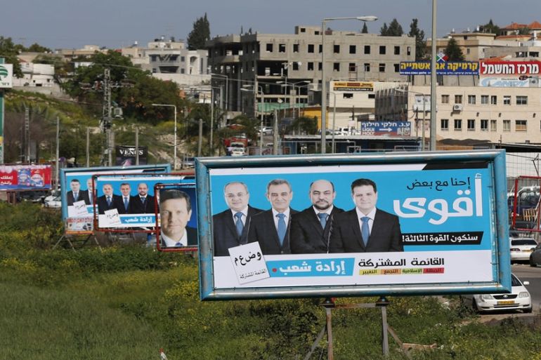 A campaign billboard for the Joint Arab List