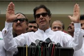 Cricket star-turned-politician Imran Khan, chairman of Pakistan Tehreek-e-Insaf (PTI), speaks to the media after casting his vote in Islamabad, Pakistan, July 25, 2018. [Reuters/Athit Perawongmetha]