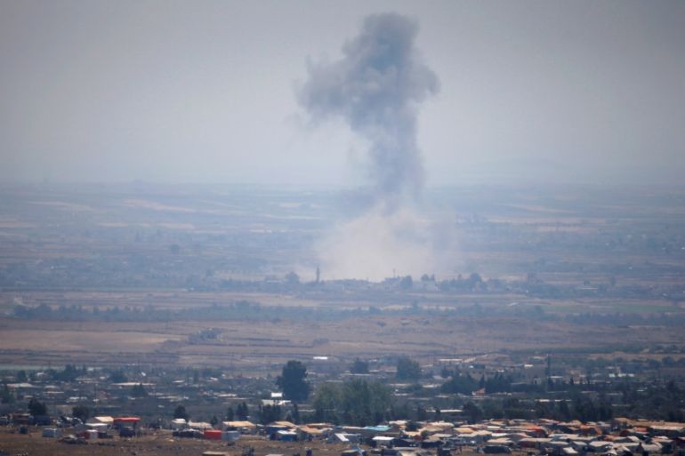 Smoke following an explosion in Syria is seen from the Israeli-occupied Golan Heights near the Israeli Syrian border