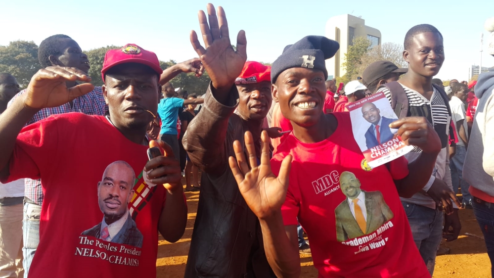 Nelson Chamisa's supporters are hopeful he will revive the economy [Hamza Mohamed/Al Jazeera]
