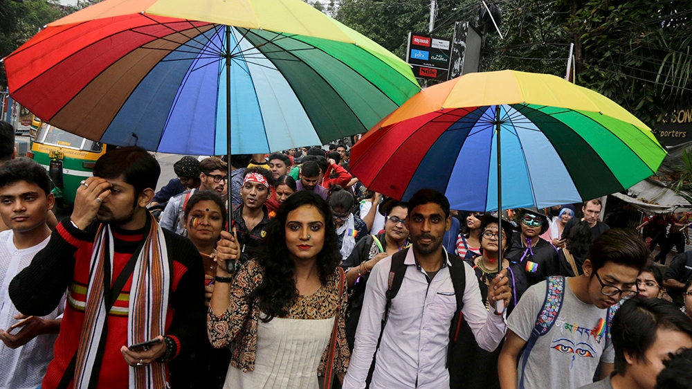 India's Lesbian, Gay, Bisexual and Transgender (LGBT) rights activists participate in a Rainbow Pride Walk in Kolkata, India, on December 10, 2017 [File: Bikas Das/AP Photo]