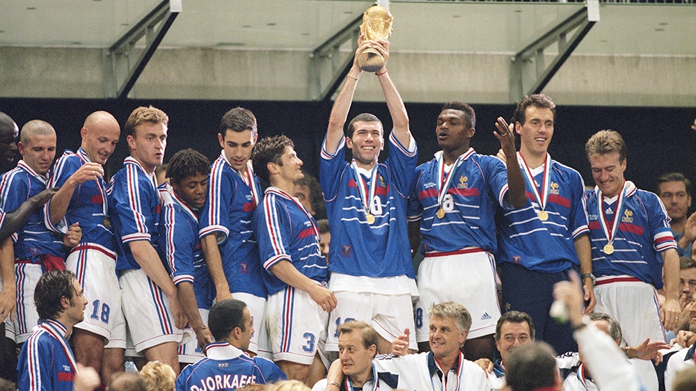July 12, 1998: Joy for France as match winner Zinedine Zidane lifts the trophy after victory [Ben Radford /Allsport/Getty Images]