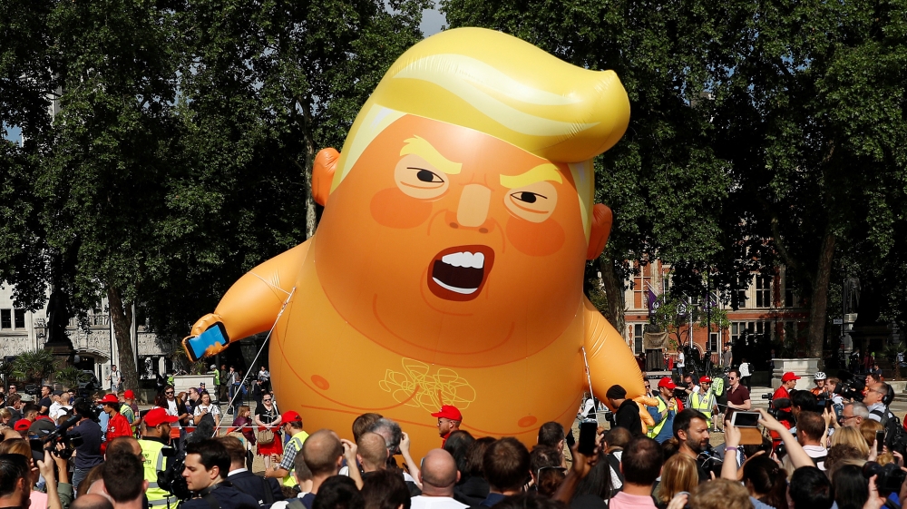 Protesters got approval to fly the Trump blimp during his UK visit [Peter Nicholls/Reuters] 