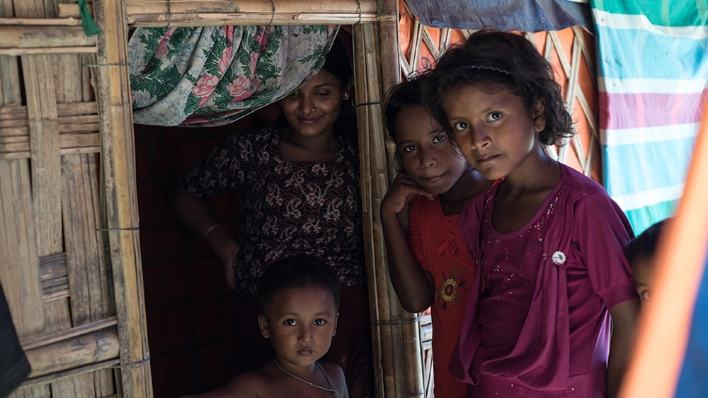 A Rohingya family in Balukhali camp [Sorin Furcoi/Al Jazeera] 
