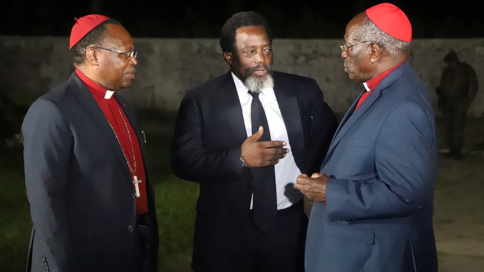 Kabila talks with religious leaders after a meeting with coalition members [Kenny Katombe/Reuters]