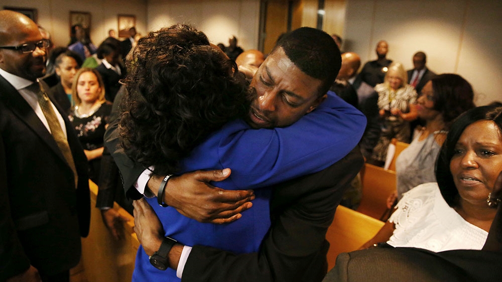 Odell Edwards, father of Jordan Edwards, gets a hug from Dallas County district lawyer Faith Johnson after hearing a guilty of murder verdict [Rose Baca/The Dallas Morning News via AP] [Daylife]