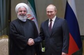 Russian President Vladimir Putin meets with his Iranian counterpart Hassan Rouhani in Ankara, Turkey April 4, 2018 [Tolga Bozoglu/Reuters]