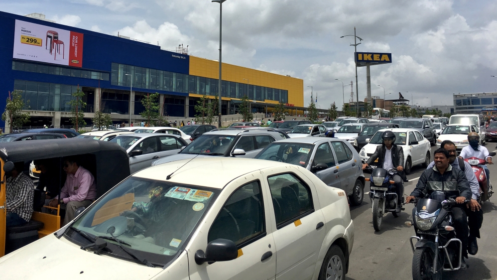 People drive past the new IKEA store in Hyderabad [Subrat Patnaik/Reuters]