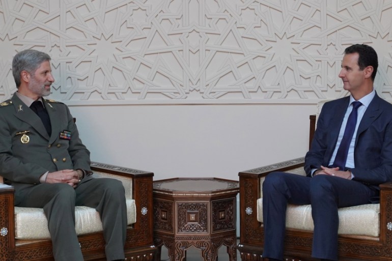 Syrian President Bashar al Assad meets with Iranian Defence Minister Amir Hatami in Damascus