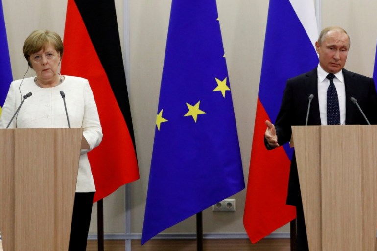 Russian President Putin and German Chancellor Merkel
